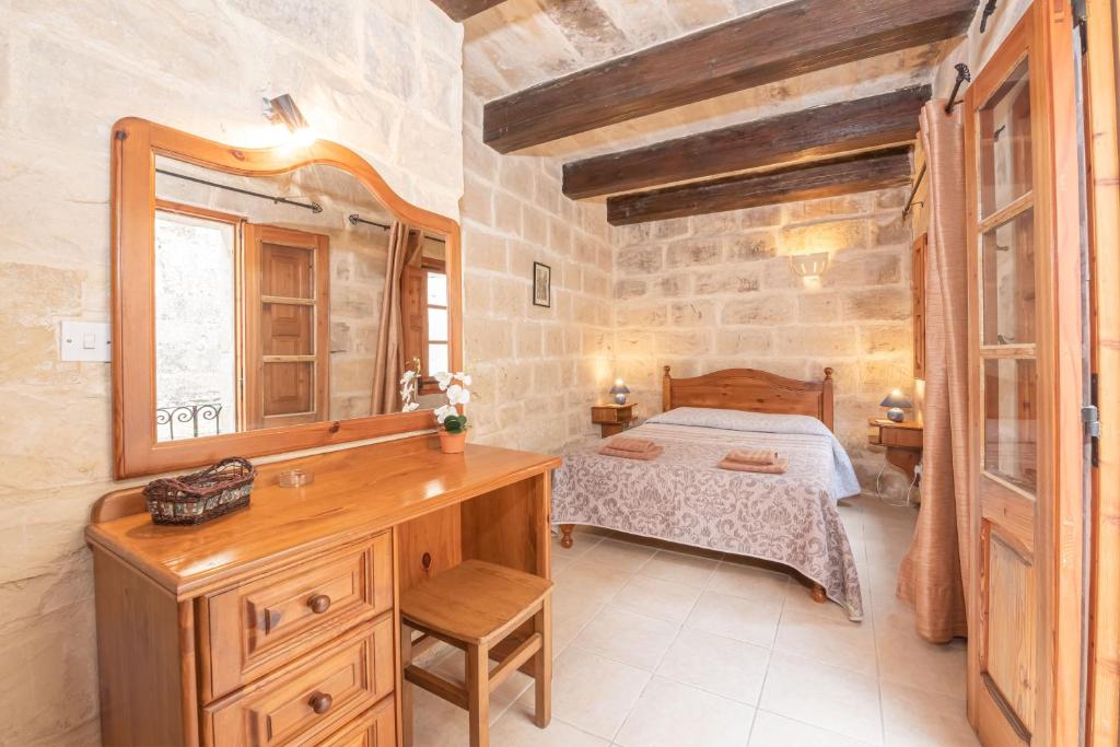 Postel nebo postele na pokoji v ubytování Casa Melita