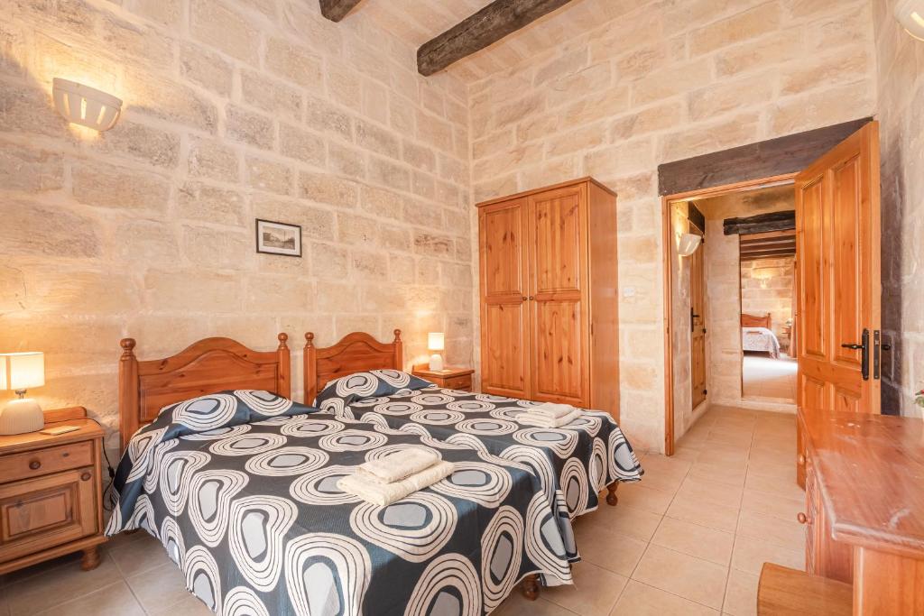 Postel nebo postele na pokoji v ubytování Casa Melita