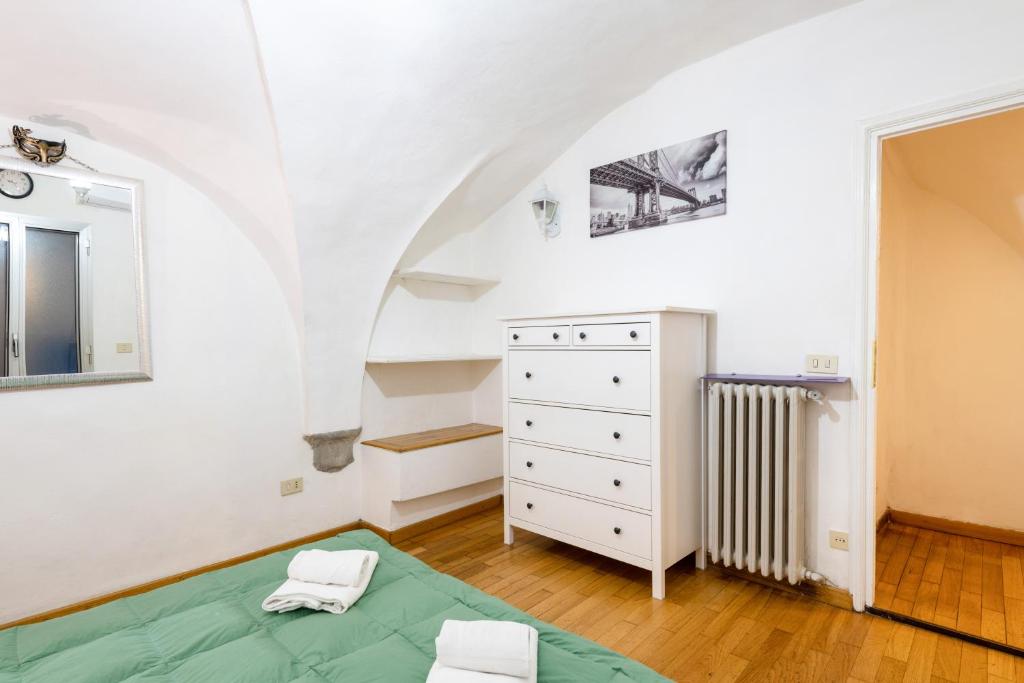 Posteľ alebo postele v izbe v ubytovaní Cattedrale di Firenze Apartment