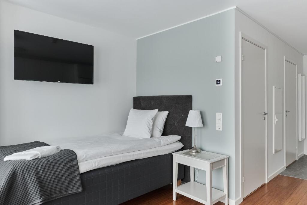 Postel nebo postele na pokoji v ubytování Continental Apartment Hotel Knivsta