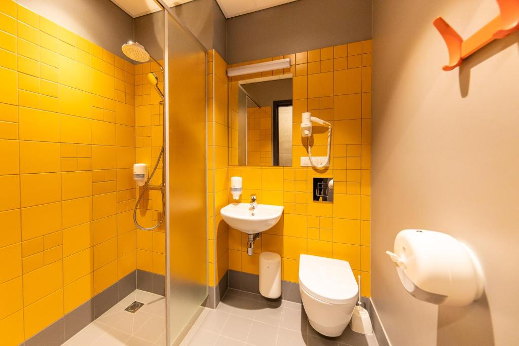 Koupelna v ubytování Stadium Hotel