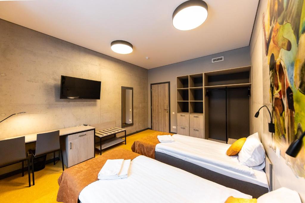 TV a/nebo společenská místnost v ubytování Stadium Hotel