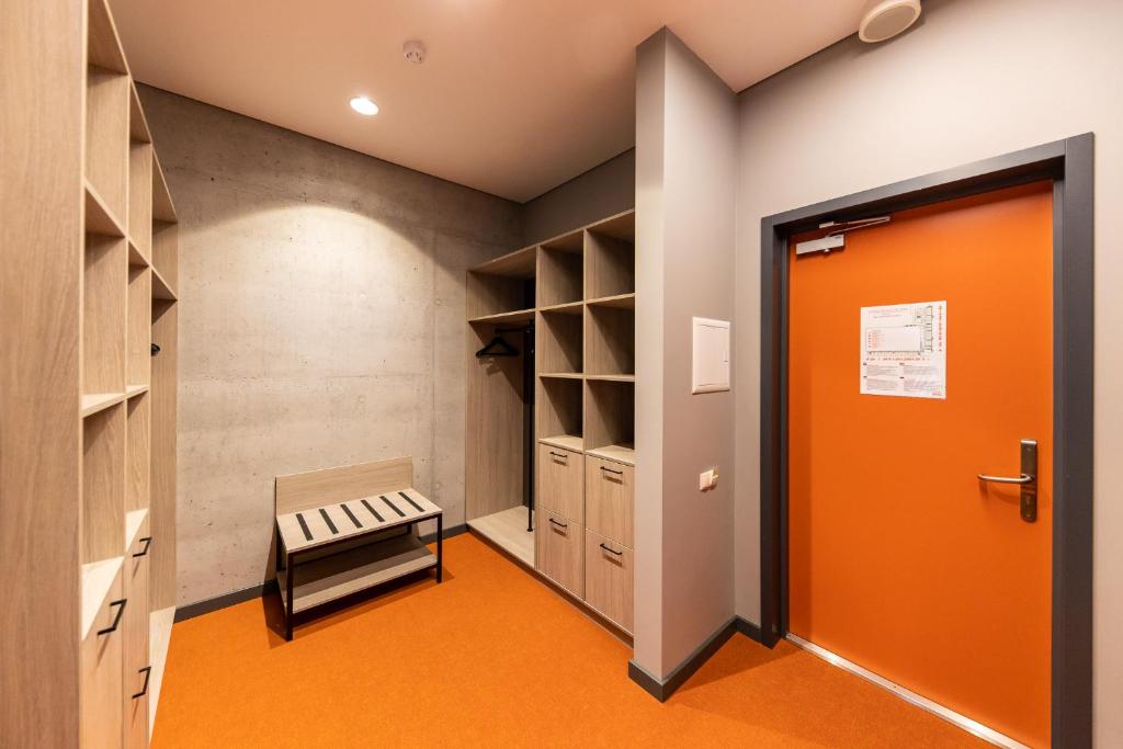Postel nebo postele na pokoji v ubytování Stadium Hotel