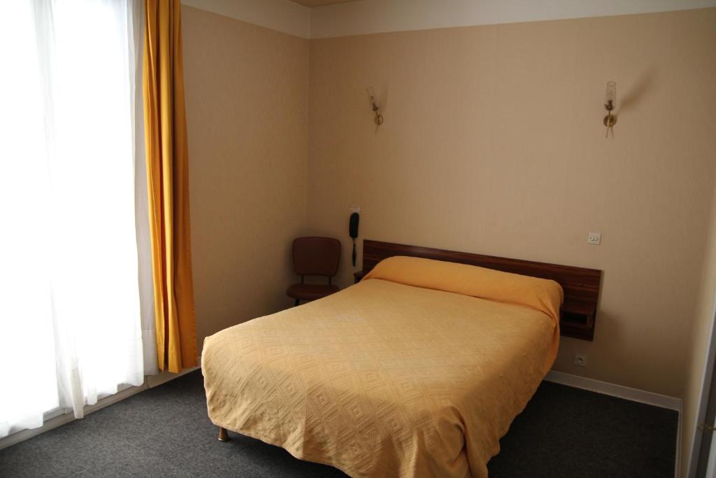 Katil atau katil-katil dalam bilik di H&ocirc;tel Sampiero Corso