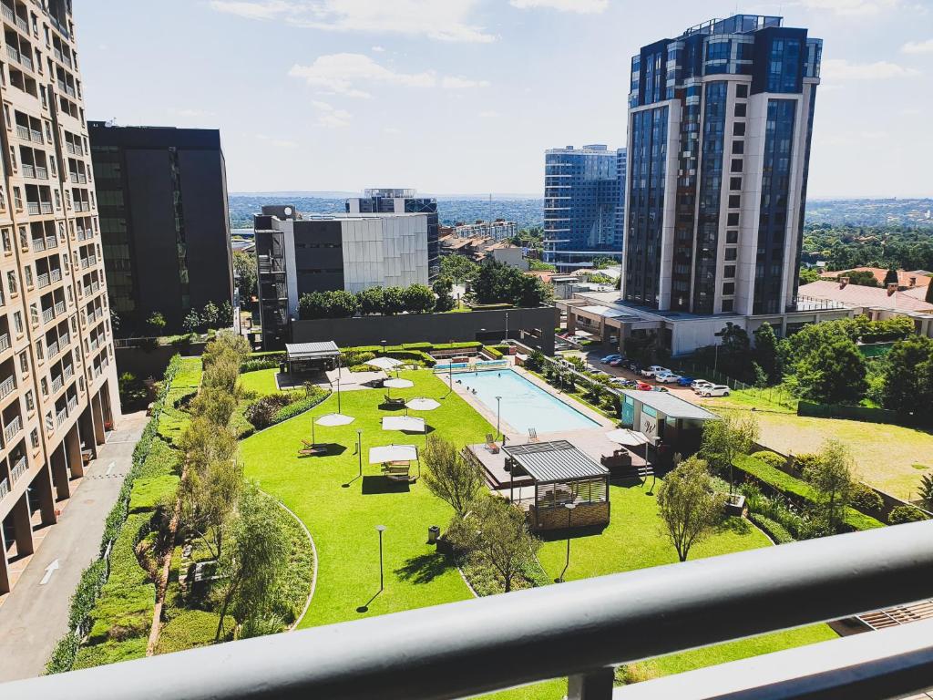 a view of a park in the middle of a city at Westpoint Sandton Apartments in Johannesburg