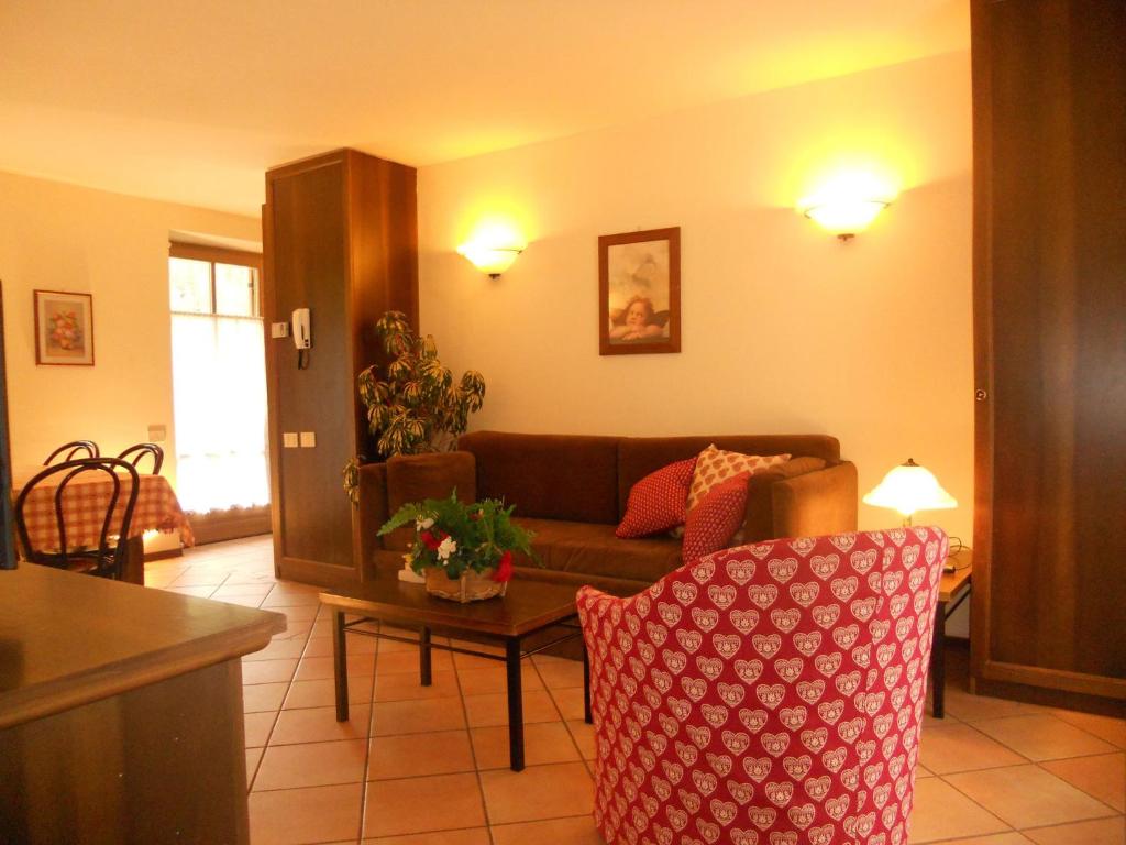 Posezení v ubytování Residence Villa Avisio