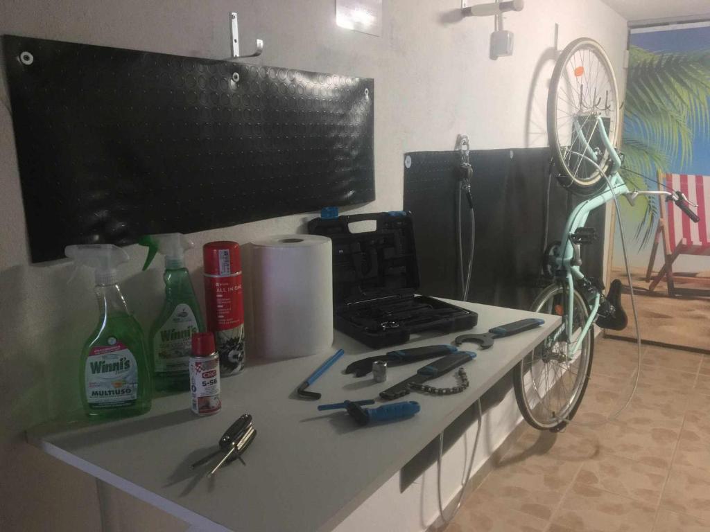 Televízia a/alebo spoločenská miestnosť v ubytovaní Fornaci 9 RivieraHoliday