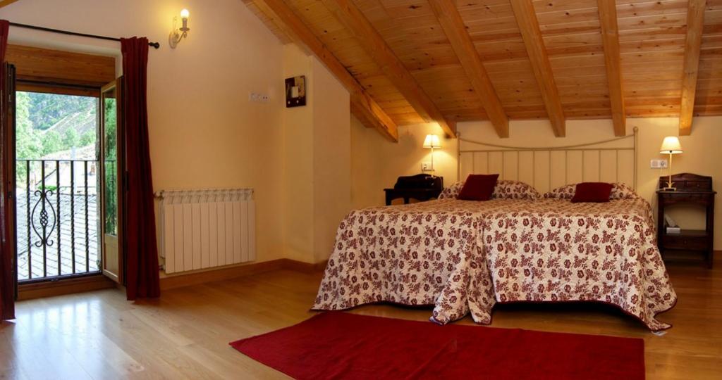 Postel nebo postele na pokoji v ubytování Casa Rural Las Verdes l y II