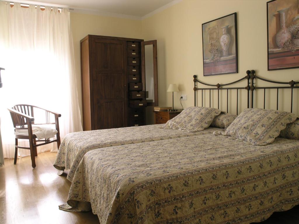 Postel nebo postele na pokoji v ubytování Casa Rural Las Verdes l y II