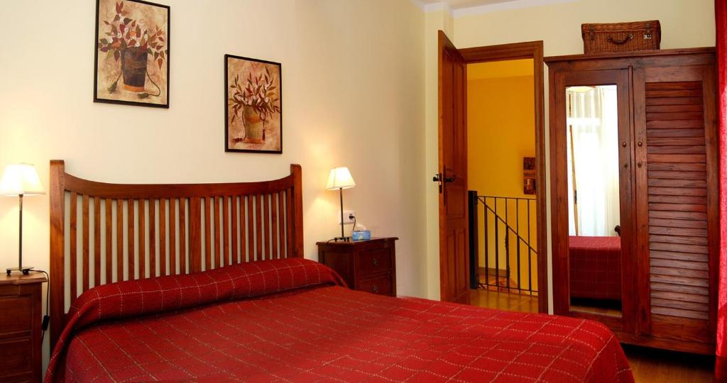 Postel nebo postele na pokoji v ubytování Casa Rural Las Verdes l y II