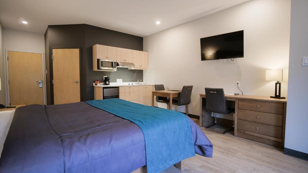 Kuchyň nebo kuchyňský kout v ubytování Motel L'Abri