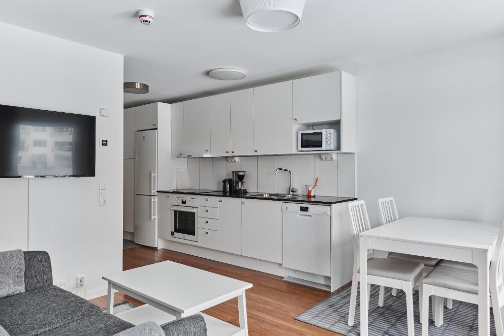 Kuchyň nebo kuchyňský kout v ubytování Continental Apartment Hotel Knivsta