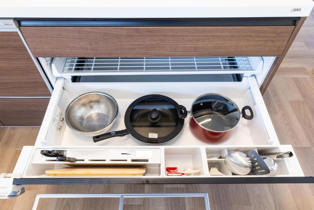 Cucina o angolo cottura di Keiko"s Home 宮浦一日一組限定海の絶景オーシャンビューのラグジュアリー別荘2000m2BBQ可海釣公園