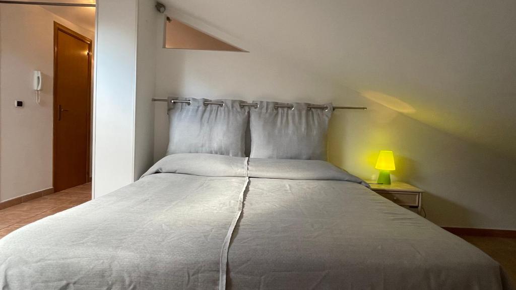 Postel nebo postele na pokoji v ubytování Casa Via Vigo