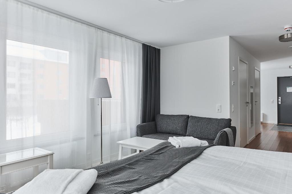 Postel nebo postele na pokoji v ubytování Continental Apartment Hotel Knivsta
