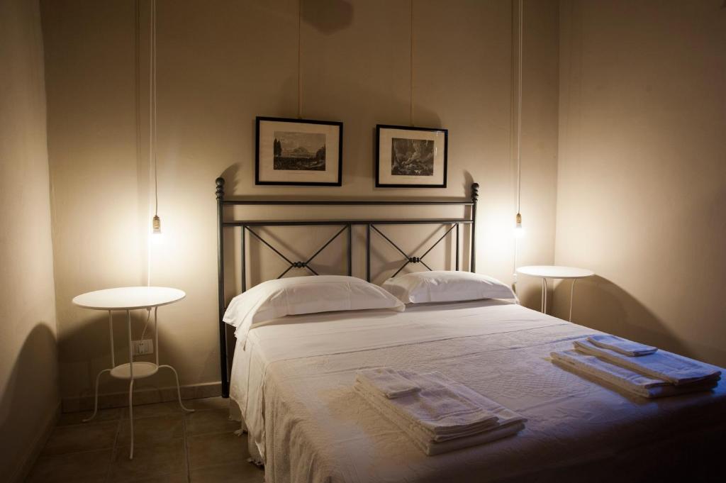 Postel nebo postele na pokoji v ubytování Masseria Boscorotondo