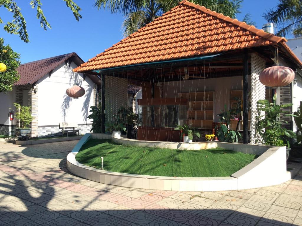 Zahrada ubytování Nhà Nghỉ TRẦN ĐỨC