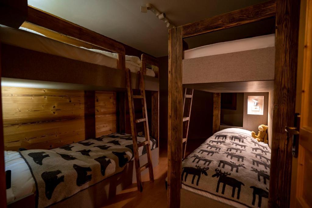 Postel nebo postele na pokoji v ubytování Peclet Appartements VTI