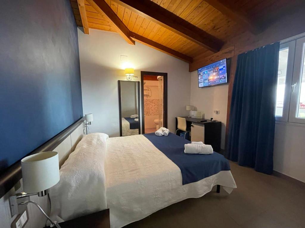Letto o letti in una camera di Il Belvedere Guest House