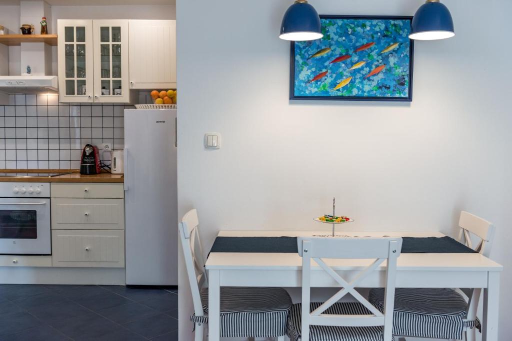 Kuchyňa alebo kuchynka v ubytovaní Blumarine Apartments