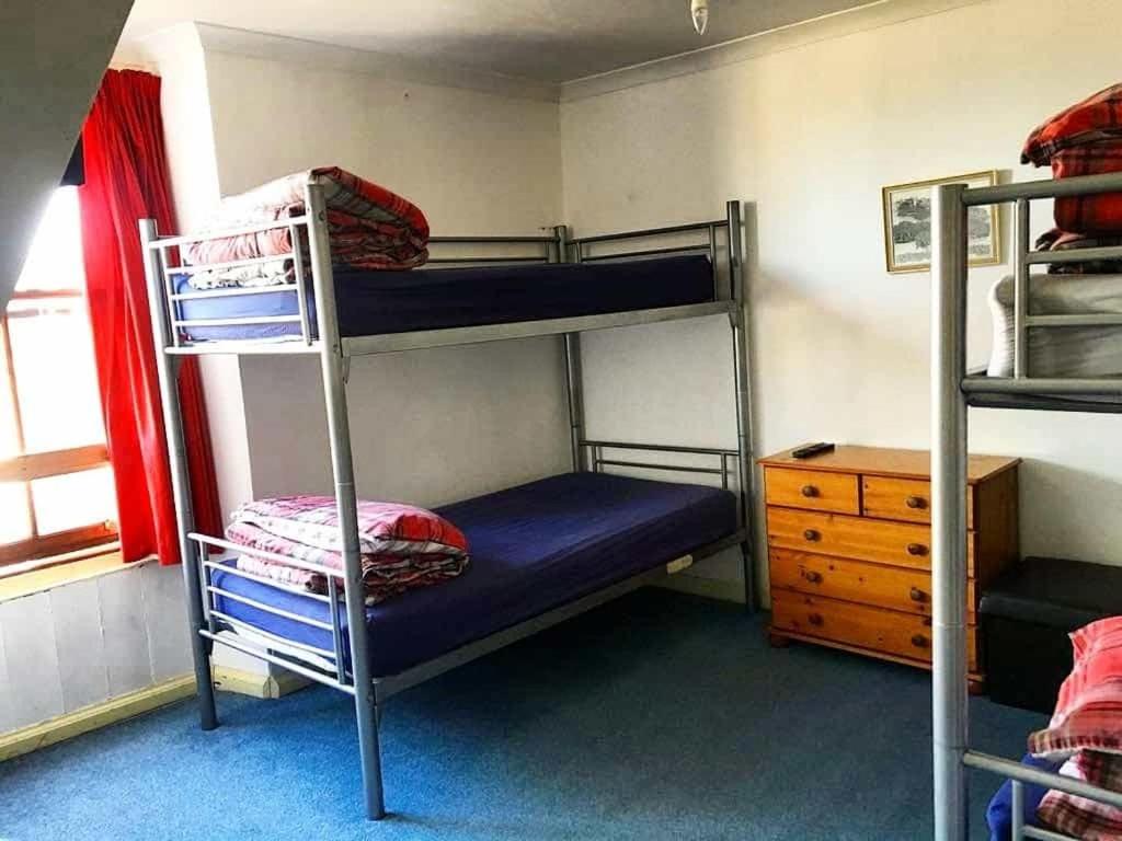 Postel nebo postele na pokoji v ubytování Argyle Backpackers