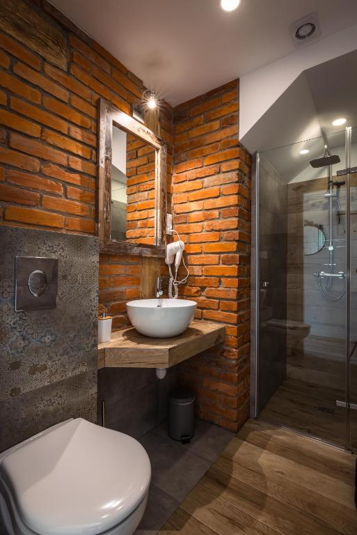 Koupelna v ubytování Apartamenty 73