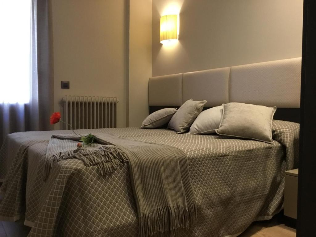 Postel nebo postele na pokoji v ubytování Apartamentos Casa Roldan