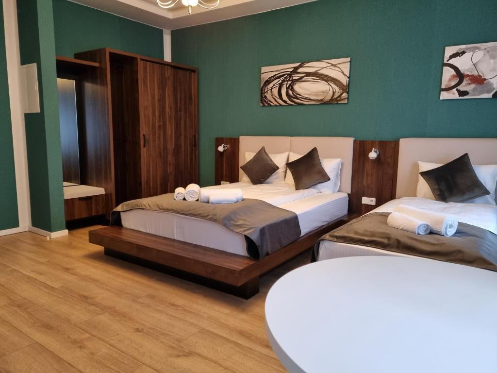 Postel nebo postele na pokoji v ubytování A&F Hotel Chemnitz