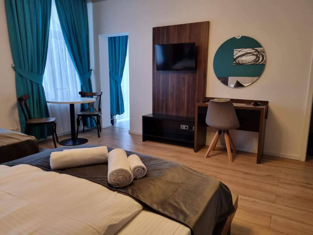 Postel nebo postele na pokoji v ubytování A&F Hotel Chemnitz