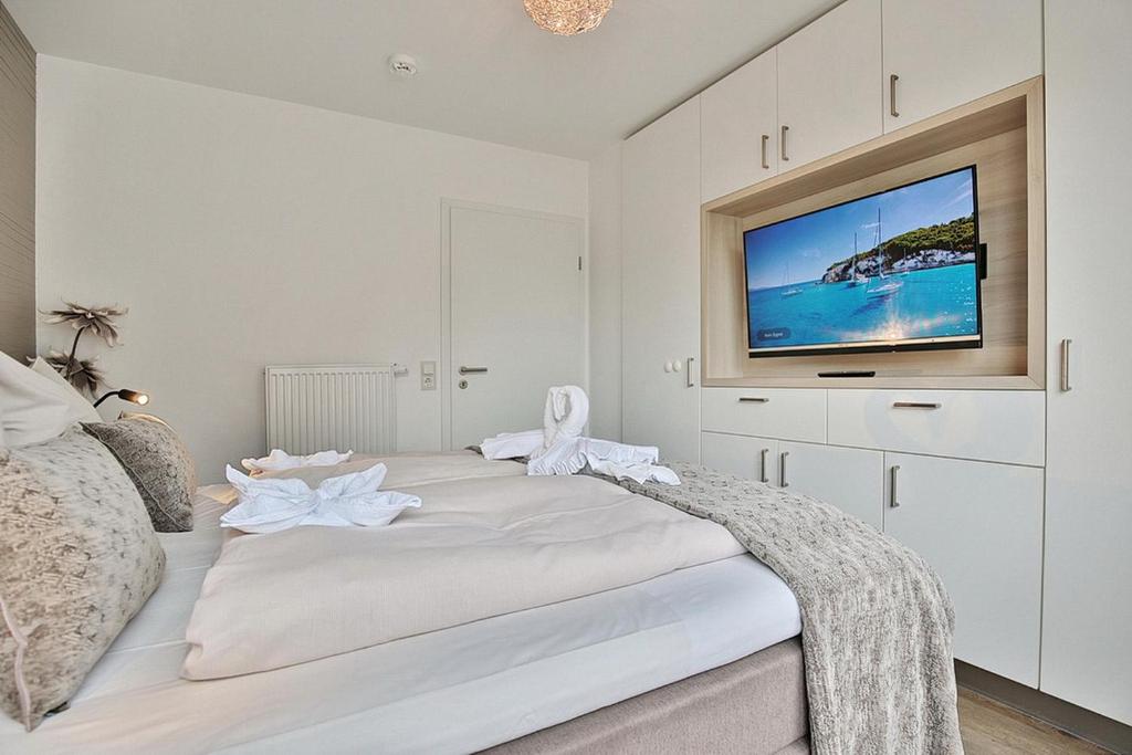 Postel nebo postele na pokoji v ubytování Residenz Herrenbruchstr Residenz Herrenbruchstraße 5 Appartement 8