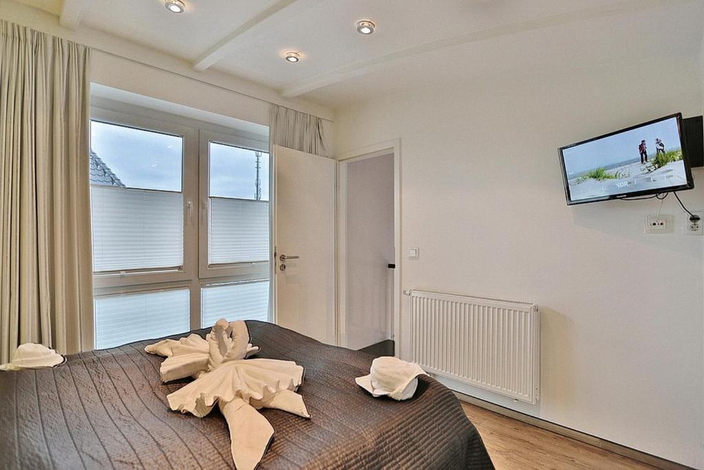 TV a/nebo společenská místnost v ubytování Residenz Herrenbruchstr Residenz Herrenbruchstraße 5 Appartement 8