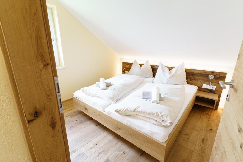 Postel nebo postele na pokoji v ubytování Hotel Die Metzgerstubn