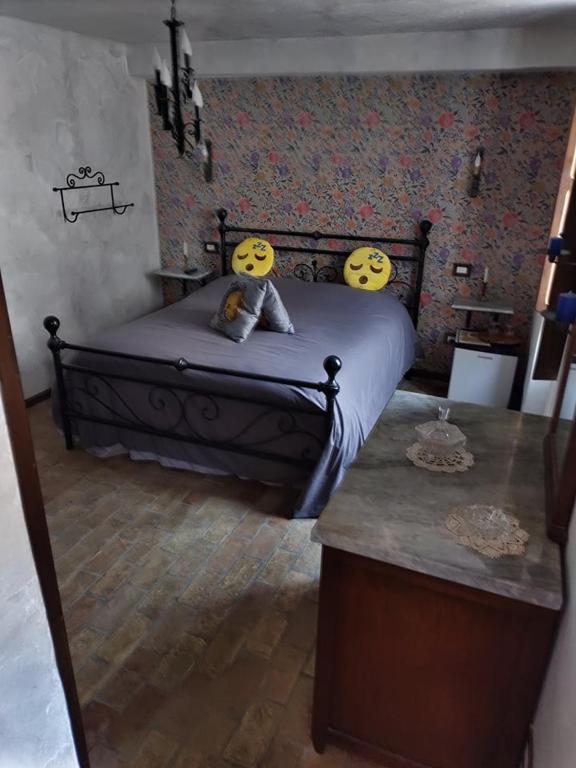 Postel nebo postele na pokoji v ubytování B&B Il Caùto