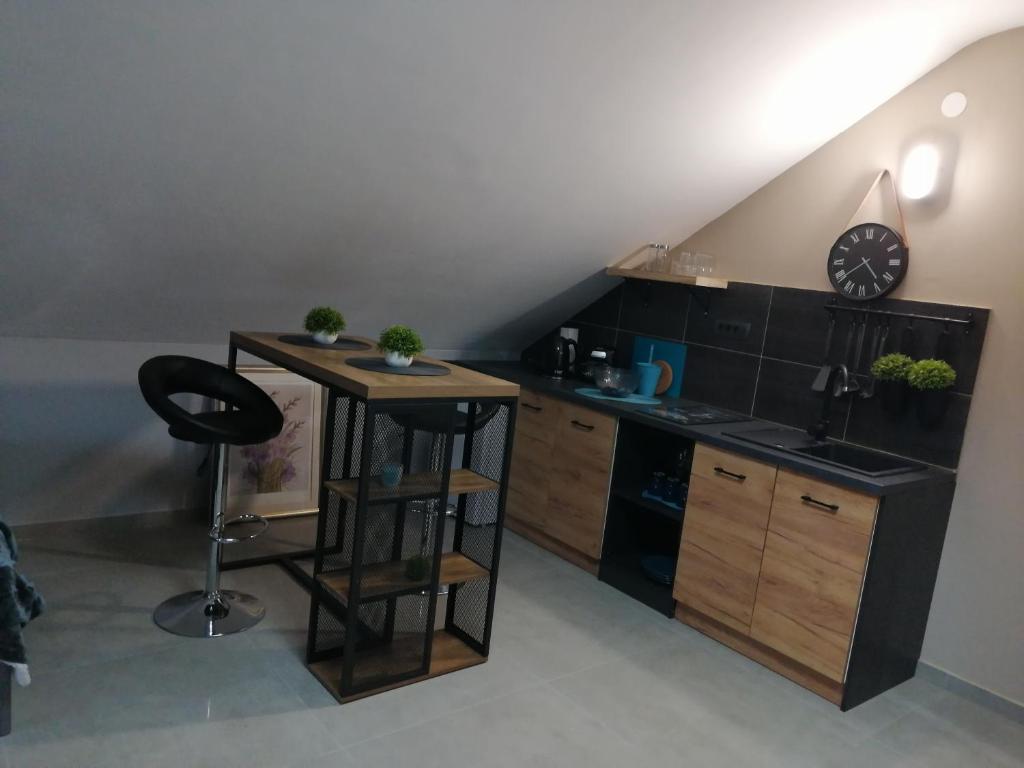 Kuchyňa alebo kuchynka v ubytovaní Apartmani Sunset