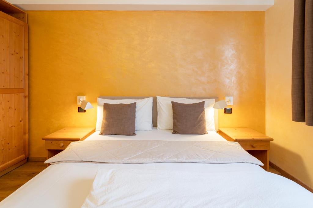Postel nebo postele na pokoji v ubytování Albergo Negritella