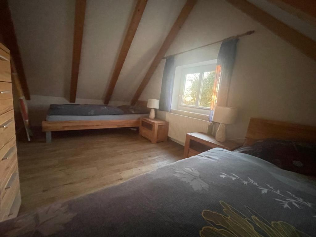Postel nebo postele na pokoji v ubytování Ferienhaus Maxe, Haus Paula