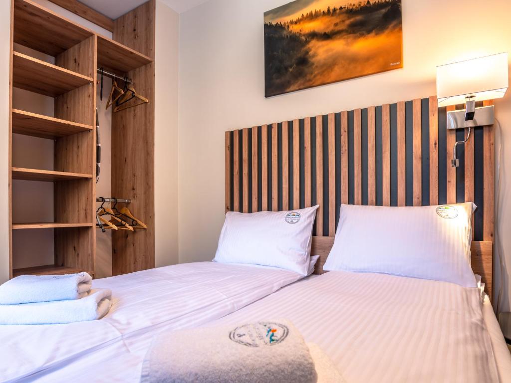 Posteľ alebo postele v izbe v ubytovaní Apartamenty na Polnej