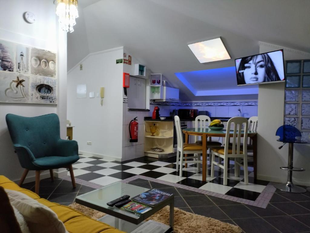 TV a/nebo společenská místnost v ubytování ATTIC BAY