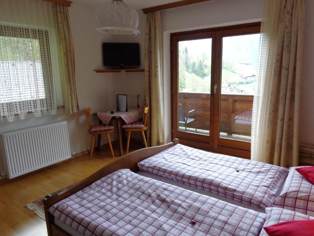 Postel nebo postele na pokoji v ubytování Haus Helga