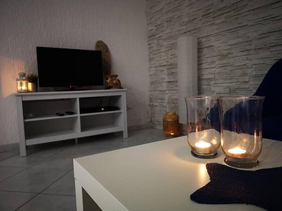 Televízia a/alebo spoločenská miestnosť v ubytovaní Easy Summer ***