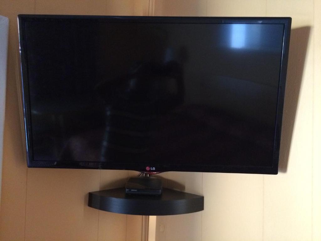 TV a/nebo společenská místnost v ubytování Simpsons Motel