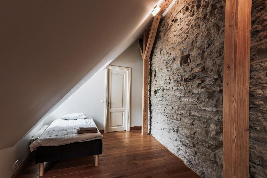 Postel nebo postele na pokoji v ubytování AirHome - Kuninga Apartment