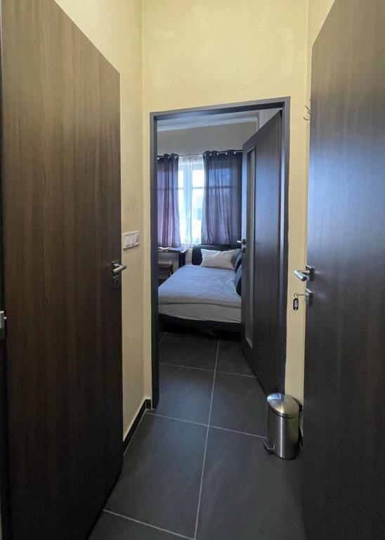 Łóżko lub łóżka w pokoju w obiekcie Stylové apartmánky