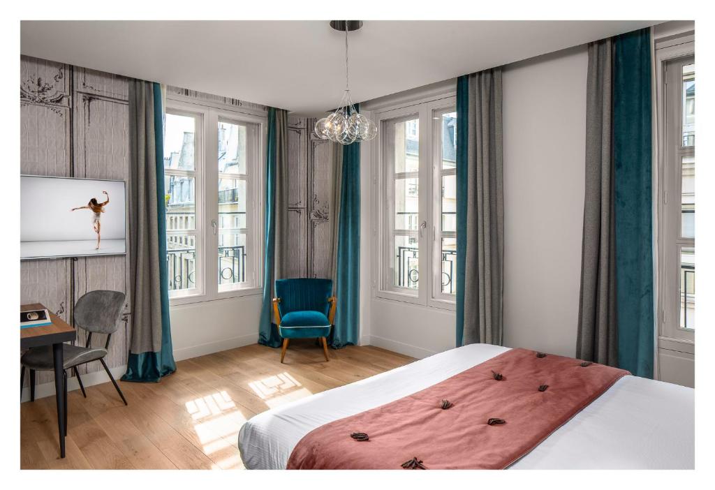 Lyric Hotel Paris Opera客房内的一张或多张床位