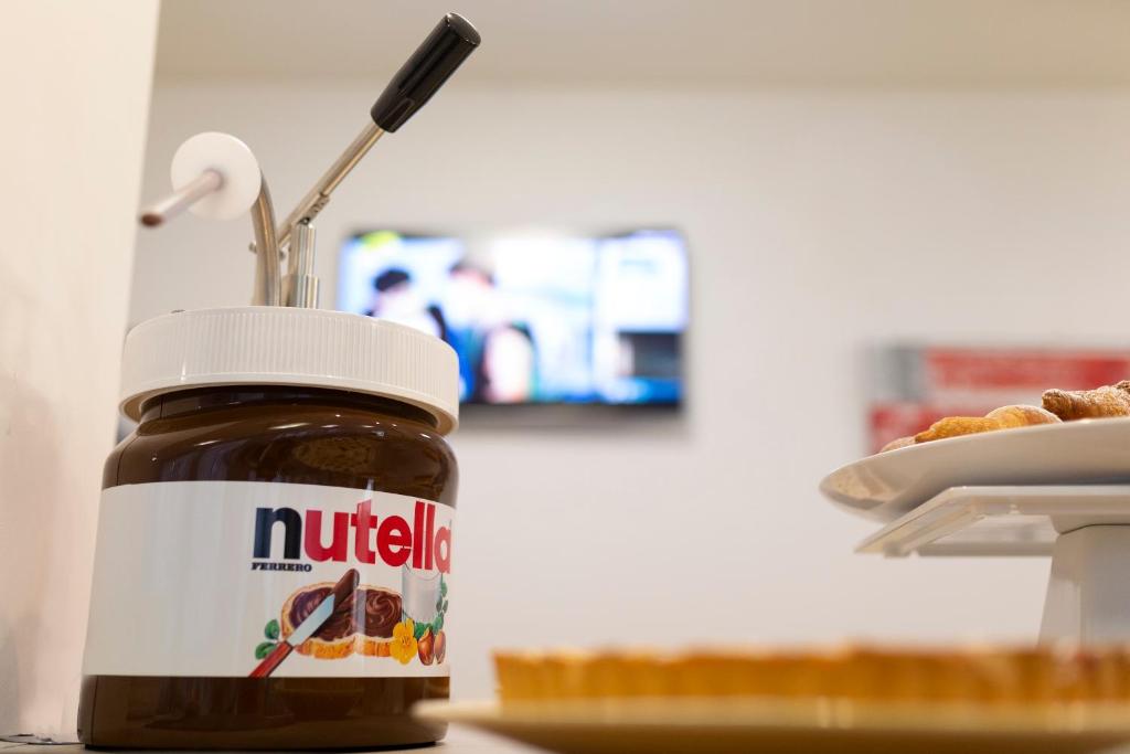 TV a/nebo společenská místnost v ubytování Hotel Mignon Riccione Fronte Mare