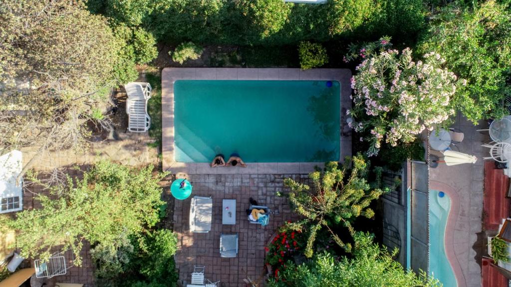 an overhead view of a swimming pool in a backyard at Mondrian Santiago in Santiago