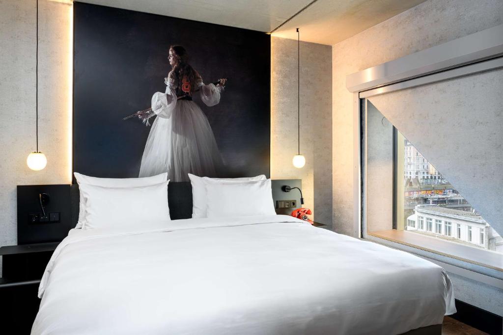 Postel nebo postele na pokoji v ubytování Radisson RED Hotel, Vienna