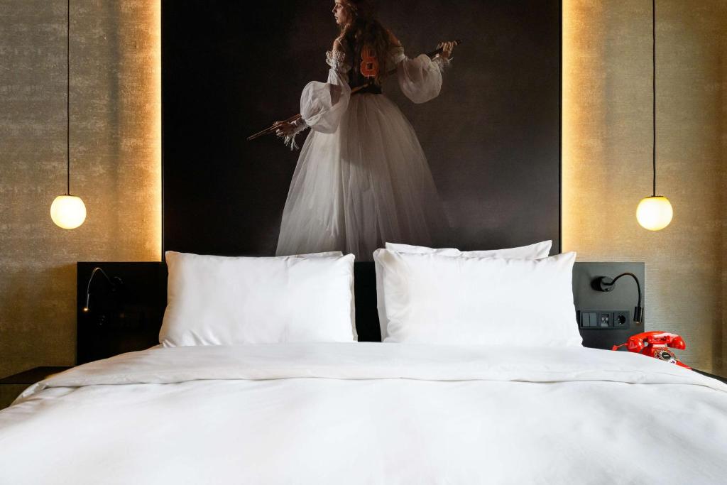 Postel nebo postele na pokoji v ubytování Radisson RED Hotel, Vienna