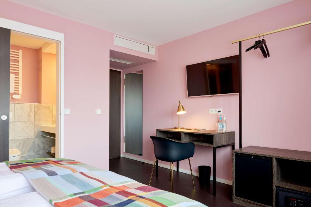 Postel nebo postele na pokoji v ubytování Central Hotel Münster