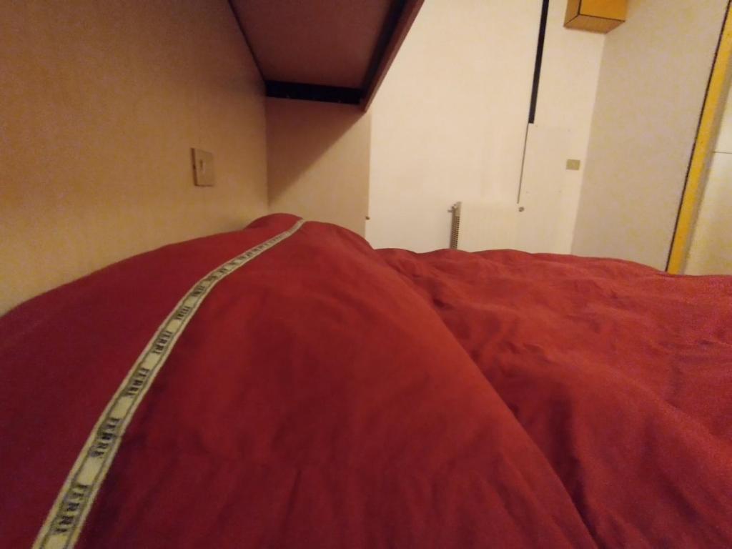 Łóżko lub łóżka w pokoju w obiekcie HIGH ALTITUDE Apartment
